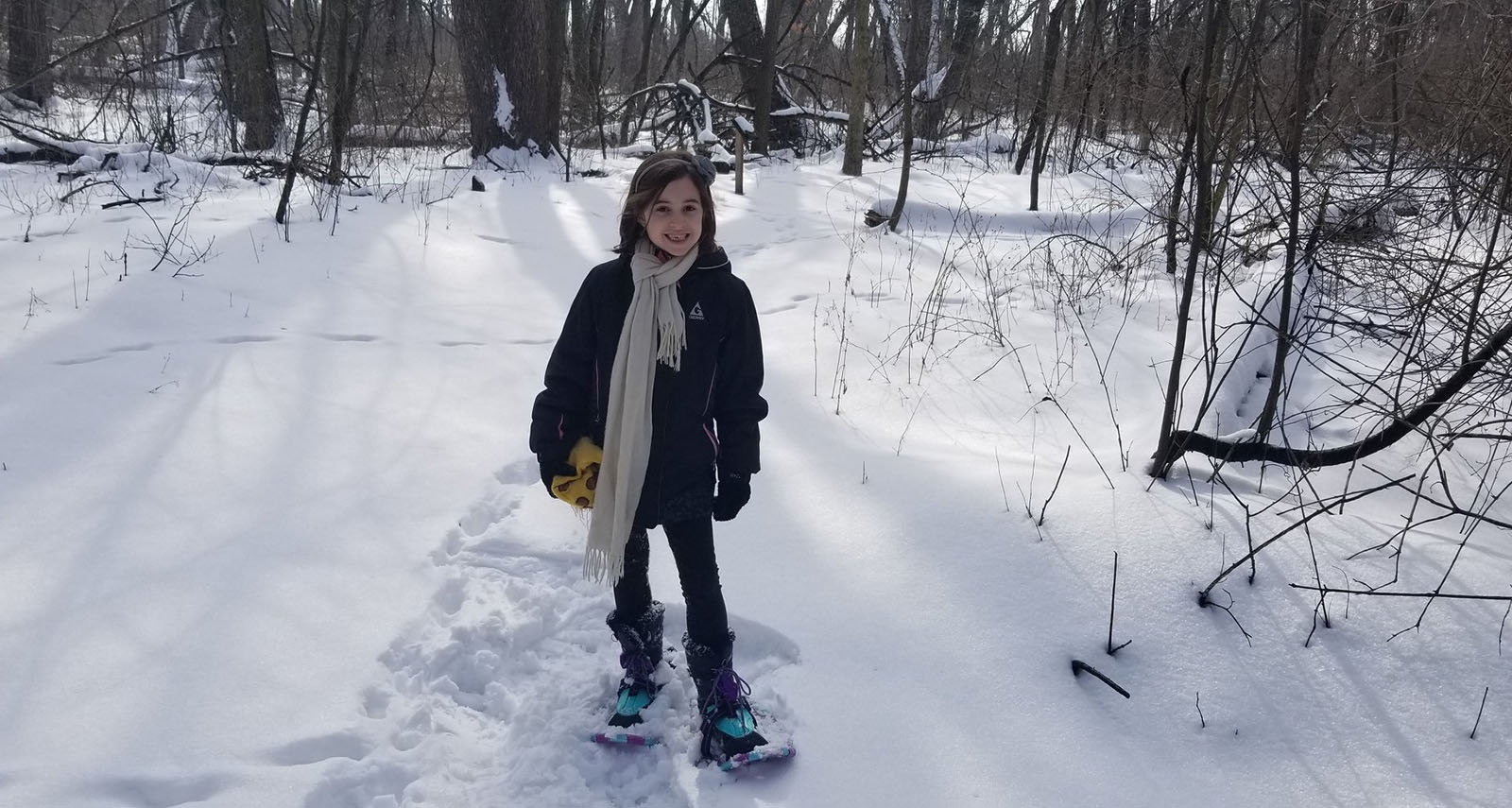 girl snowshoeing